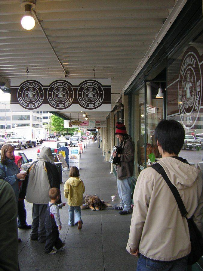 Outside Starbucks flagship location, Pike Place Market, Seattle, WA. This is sometimes referred to as the "original" Starbucks, but in fact the original Starbucks shop was in a building one block nort